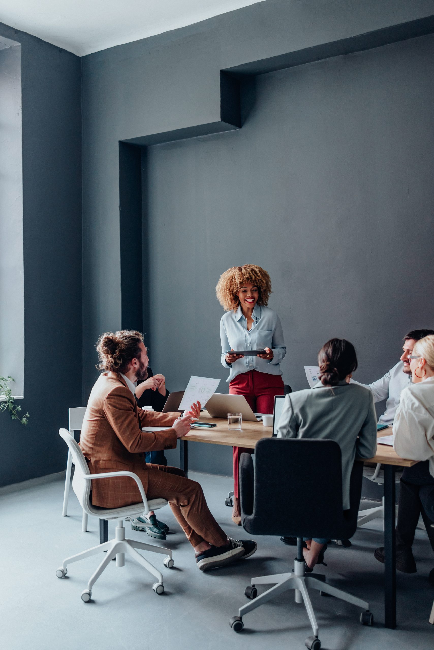 Group Of Businesspeople On A Meeting At Their Company